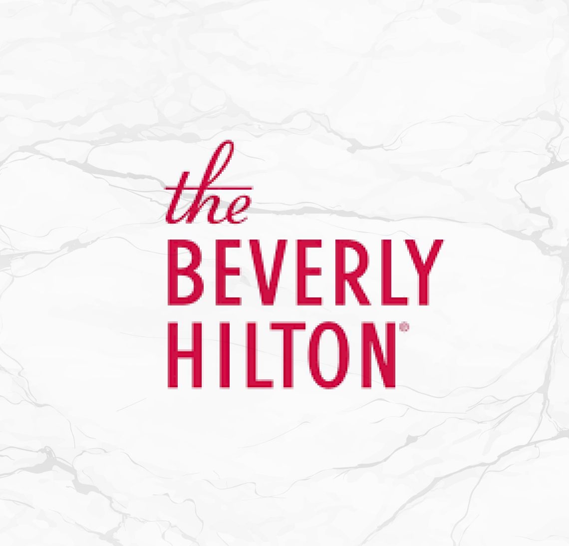 Beverly Hilton hotel logo on marble background