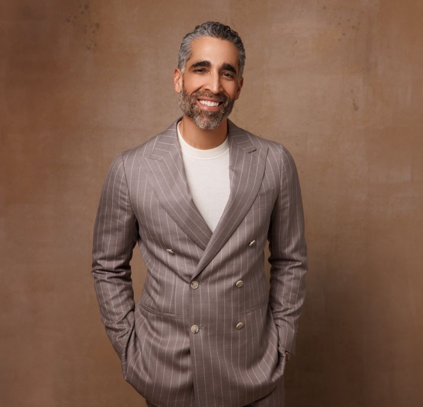 Dr. Nima Shemirani, Beverly Hills Facial Plastic Surgeon in a gray suit