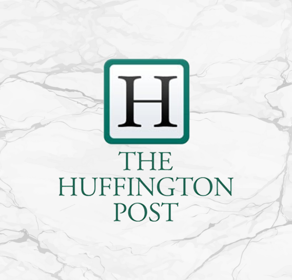 The Huffington Post logo on marble background