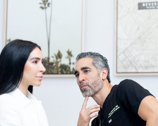 Consultation between two professionals in an office.